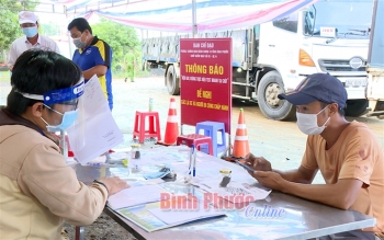 Chốt kiểm soát dịch COVID-19 tại quốc lộ 14, xã Phú Sơn, huyện Bù Đăng. (Ảnh: Báo Bình Phước)