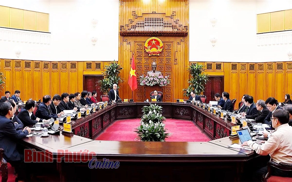 Ủy viên Trung ương Đảng, Bí thư Tỉnh ủy Nguyễn Văn Lợi báo cáo tại buổi làm việc với Thủ tướng và các bộ, ngành